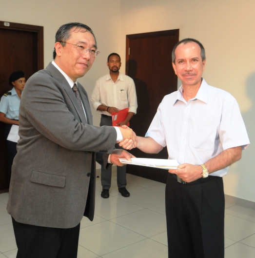 Minister Joel Morgan accepts donation from IMO's Yoshiaki Ito Photo: Seychelles Nation