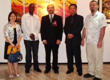 Nigel Henry (2nd left) and Bernard Pool (right) on the opening day with the president and vice-president of Unique – Seychelles’ design agency for the Shanghai World Expo – and Ambassador Philippe Le Gall (centre)