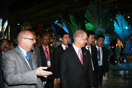 President Michel (right foreground) visiting the Seychelles Pavilion at the Shangai World Expo 2010. On the left is Ambassador Le Gall