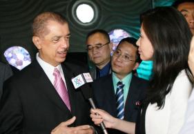 President Michel (left) is interviewed by foreign journalists in China