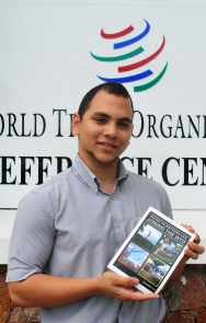 Mr Chang Sam with a copy of the booklet explaining more about the WTO