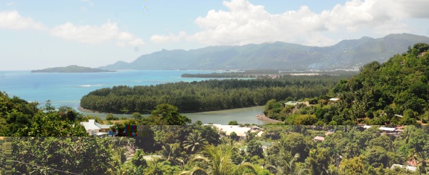 Arrow showing Ile Aurore, one of the reclaimed islands which will be used for business activity