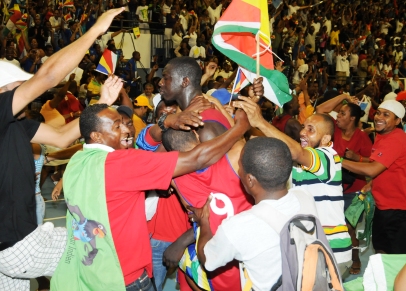 Abdel Sylla and Reggie Ah-kong are mobbed by fans