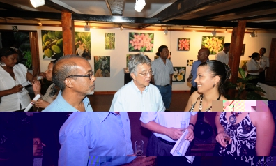 Artist Rita Morel (right) shares a light moment with Minister Shamlaye and artist Egbert Marday