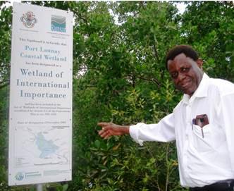 The secretary general of Ramsar, Tiega Anada, at the first Ramsar site in Seychelles which is at Port Glaud