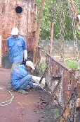 Workers starting work to dismantle the vessel