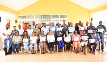 Tour guides receive certificates after successfully completing training