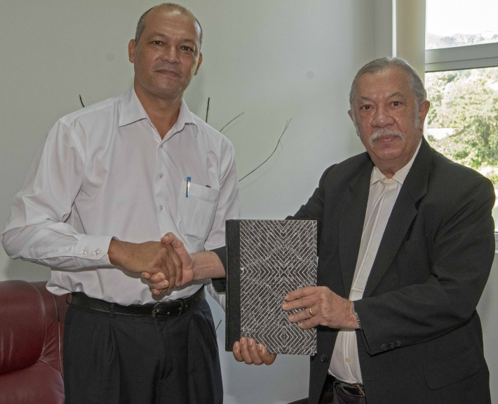 Justice MacGregor hands over compilation of legislative documentations to Speaker Prea