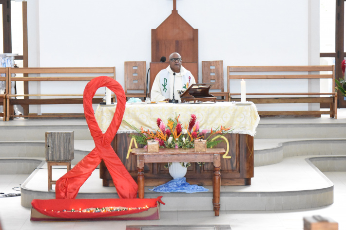 Anse Aux Pins parish church resumes services with Aids candlelight memorial