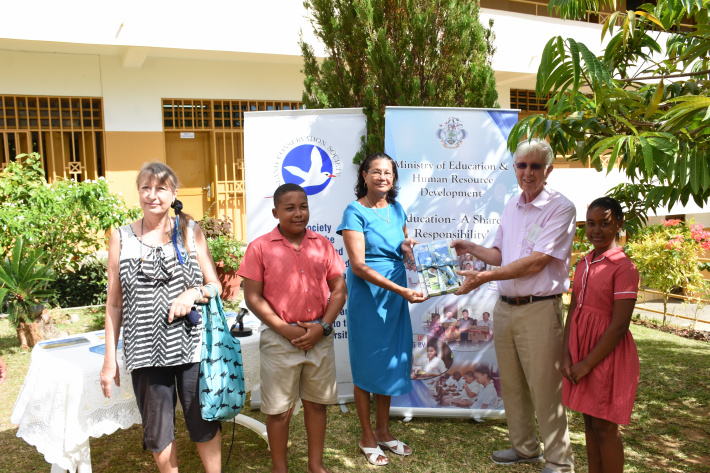 Island Conservation Society donates books to schools