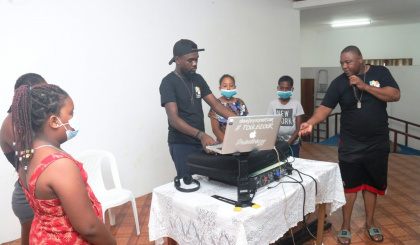 Children learn the basics of disc jockeying