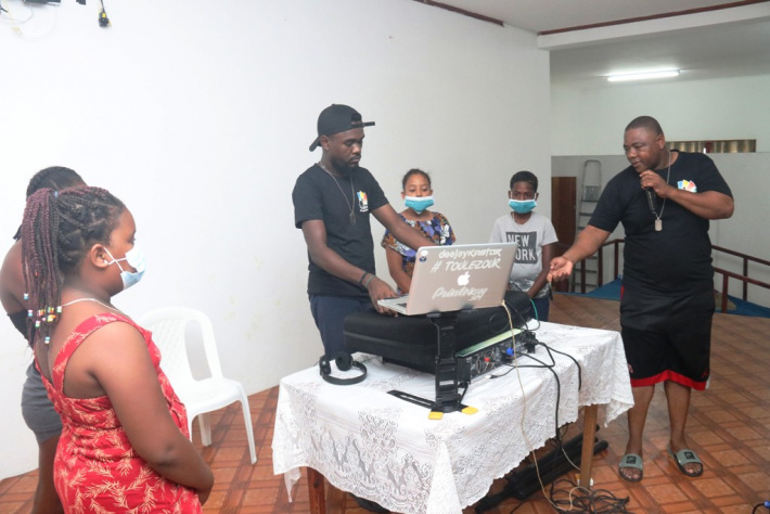 Children learn the basics of disc jockeying