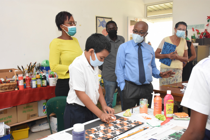 Education Minister Dr Justin Valentin visits schools at start of second semester