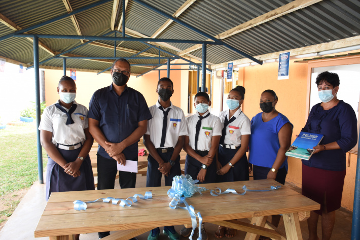 IDC donates benches to Pointe Larue secondary school