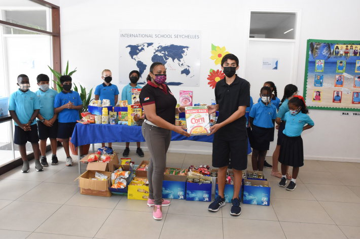 ISS students donate food items to Red Cross society