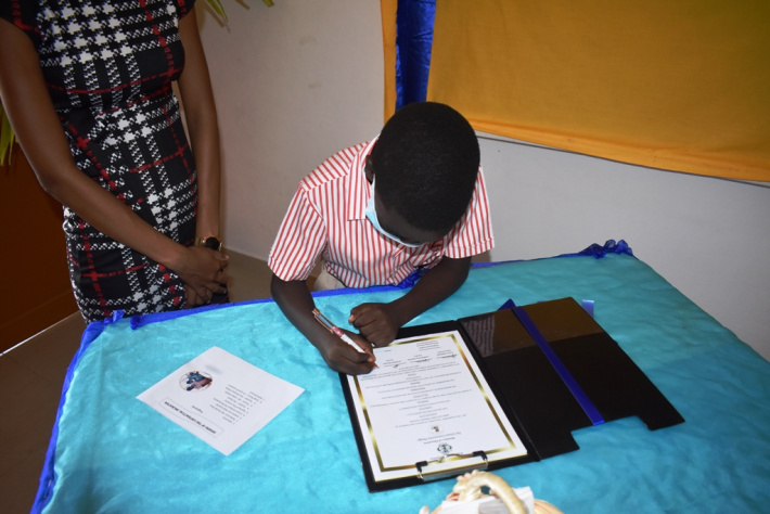 Signing of contractual obligation at Anse Aux Pins school