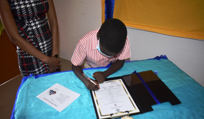 Signing of contractual obligation at Anse Aux Pins school