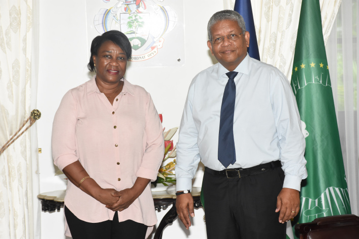 President congratulates Doreen Valentin on promotion to hotel manager