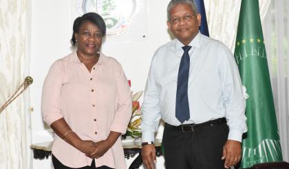 President congratulates Doreen Valentin on promotion to hotel manager