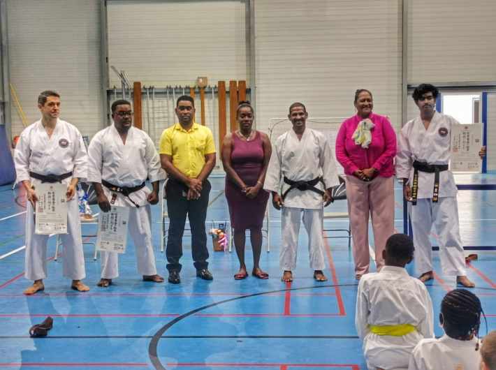 Karate  Three Shotokan karatekas awarded 1st dan black belts