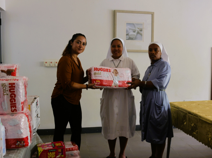 Gran Kaz donates essential items and goodies to the children at Foyer de la Providence