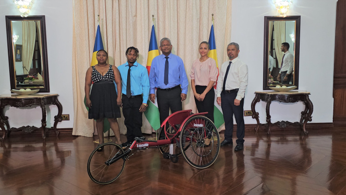 Paralympics athlete Gerry Thérésine receives racing wheelchair from President Ramkalawan