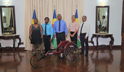 Paralympics athlete Gerry Thérésine receives racing wheelchair from President Ramkalawan