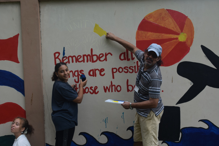 ISS students brighten up Plaisance primary’s campus with colourful mural