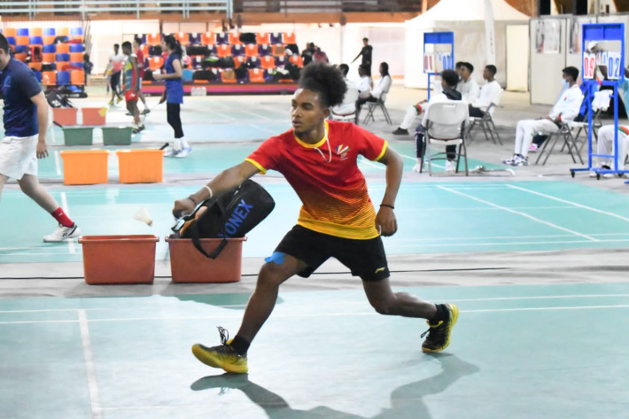 Three badminton players cruise into second round