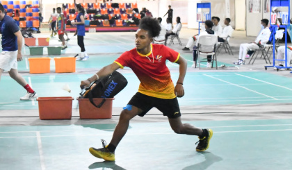 Three badminton players cruise into second round