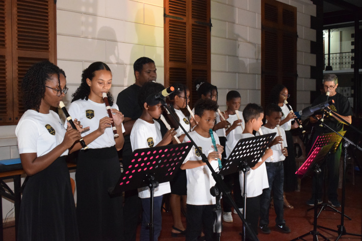 Children display skills learned in holiday music camp