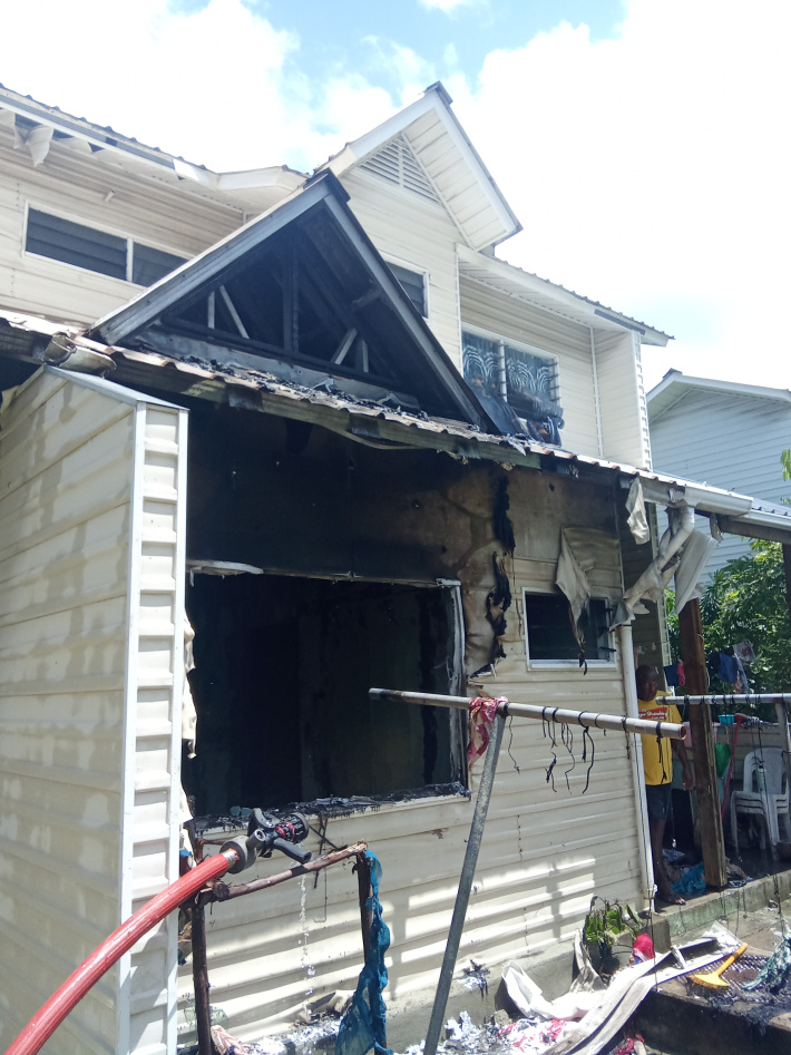 House partially damaged  by fire at Perseverance 2   