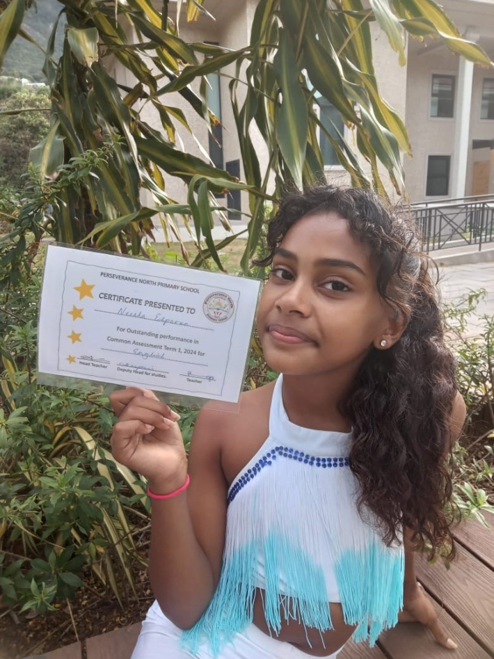 Neesha Esparon shines on stage and at school