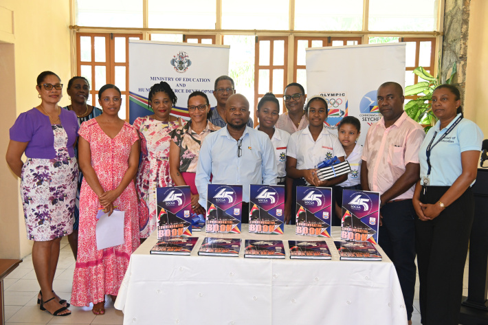 Socga donates copies of commemorative coffee book to education ministry