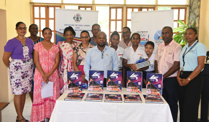 Socga donates copies of commemorative coffee book to education ministry